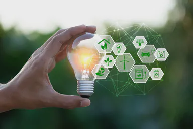 Een gloeilamp met elementen van de energiesector