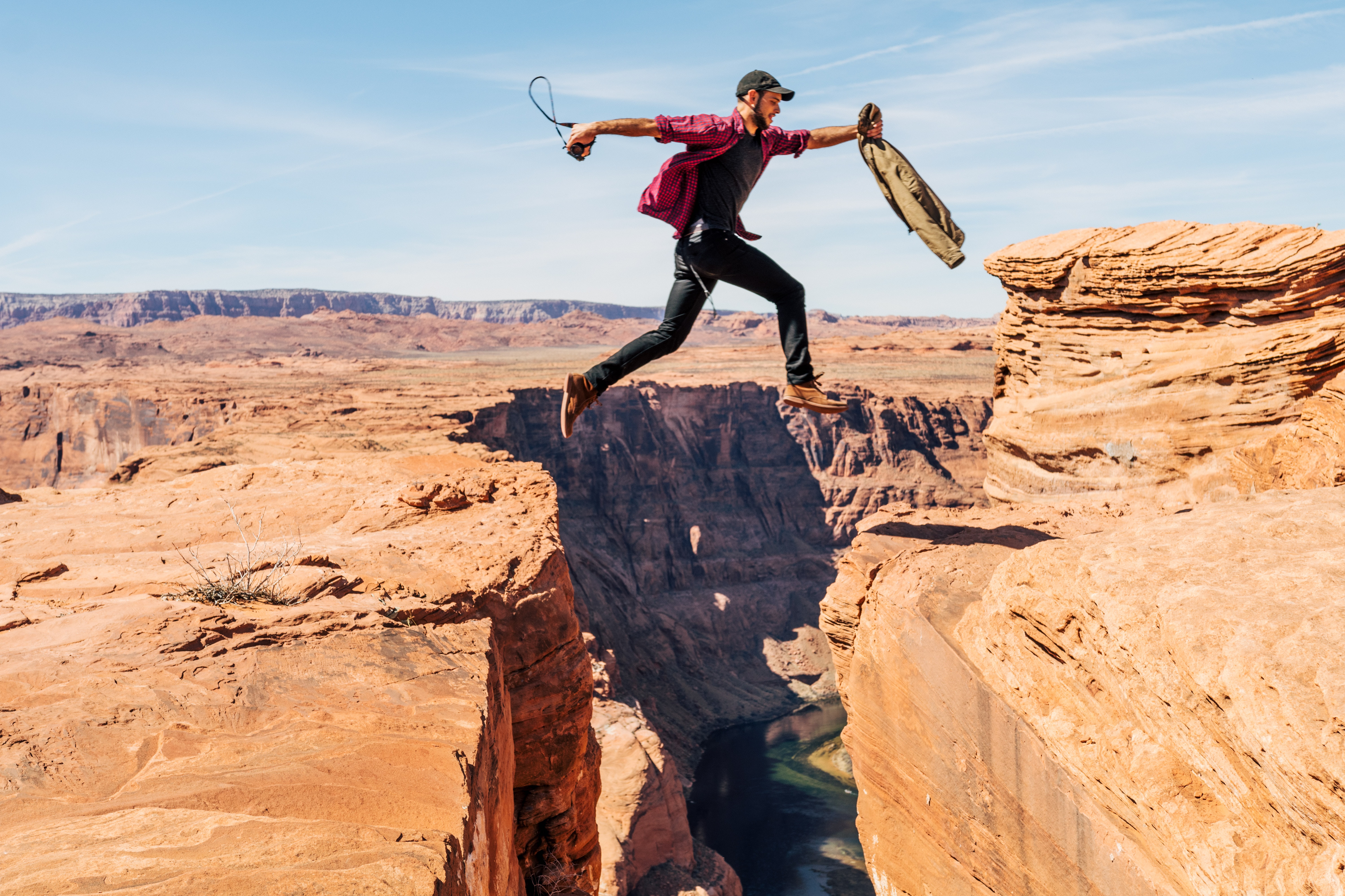 Someone jumping over a chasm