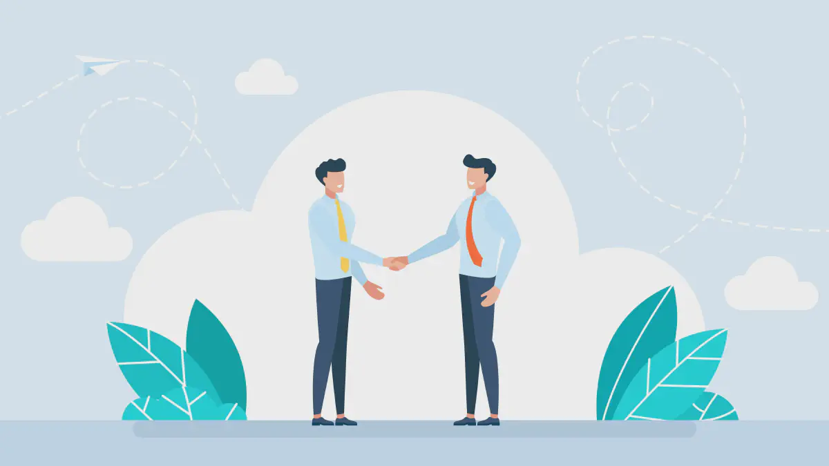 Two men with ties shaking hands