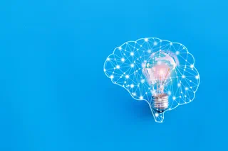 A brain depicted as a network generating an idea
