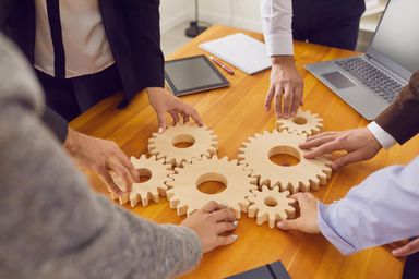 People turning gears